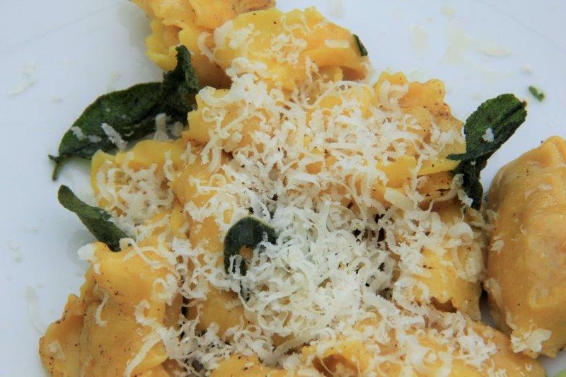 Tortellini with sage and butter sauce dresses with Parmigiano Reggiano www.compassandfork.com