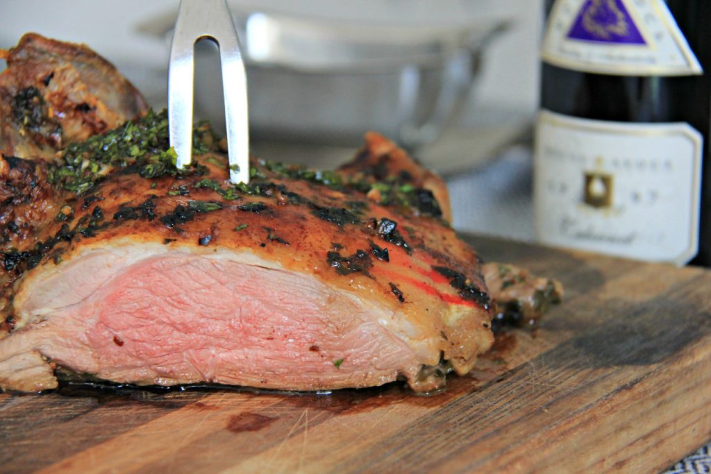 Chiloe and Patagonia Roast Lamb with Chimichurri Sauce -Carving the lamb 2 www.compassandfork.com