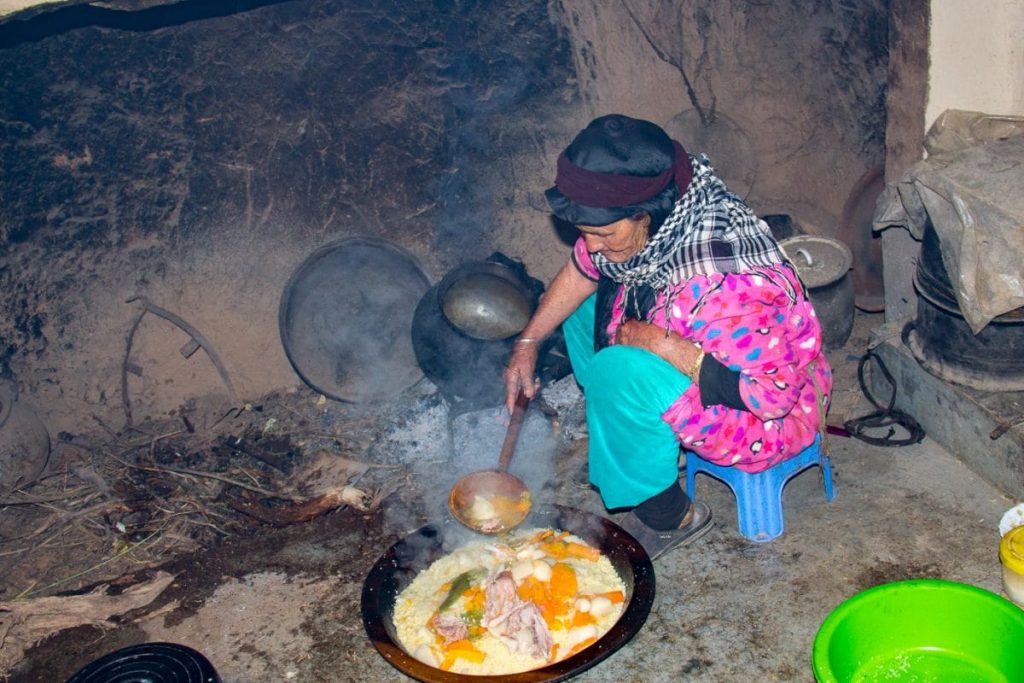 Berber People- eating in a traditional Berber home in Morocco- couscous